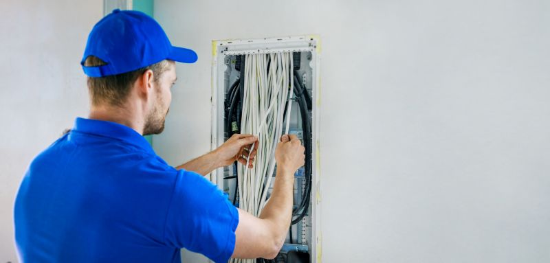 Skilled Electricians Performing Work